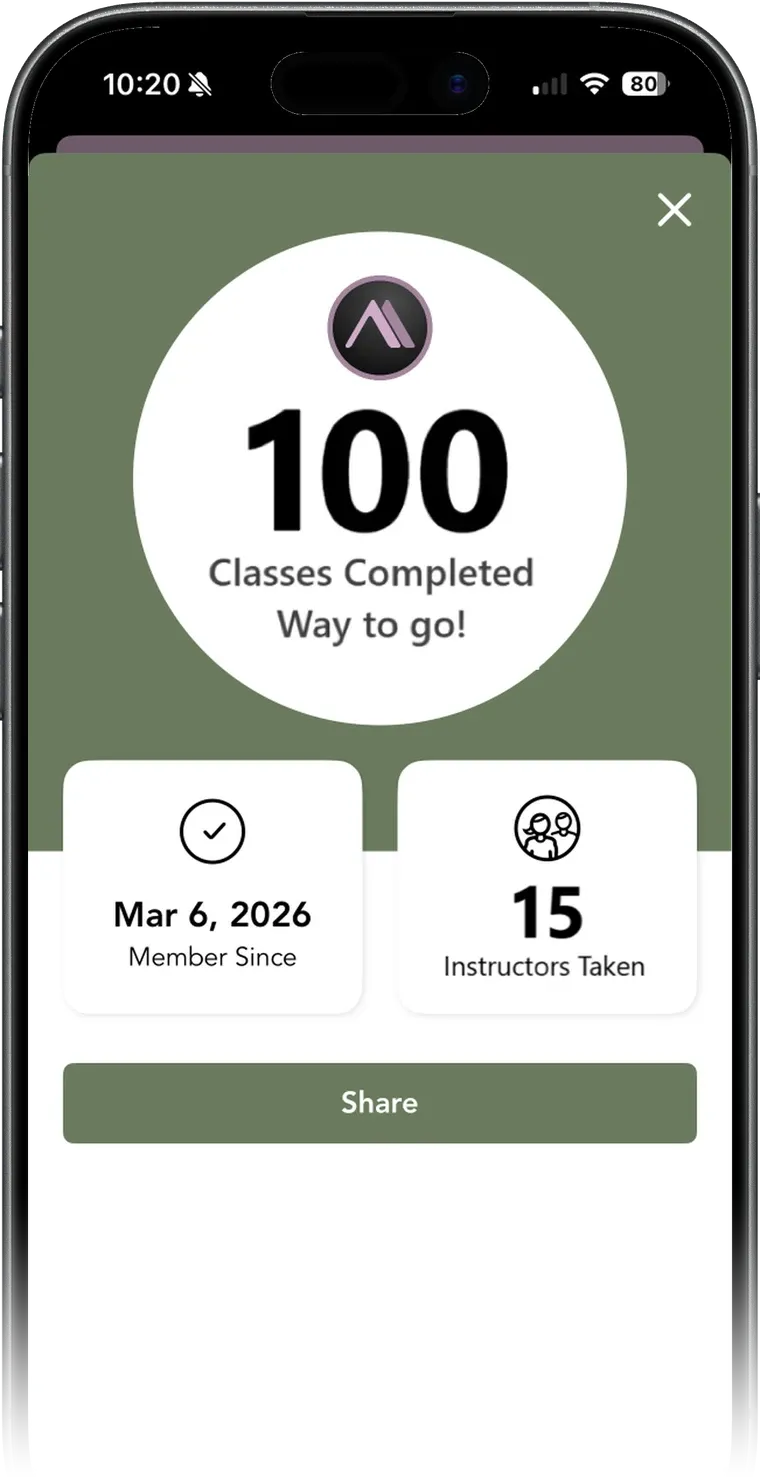 The Align Studio app showing 100 classes completed and member milestones